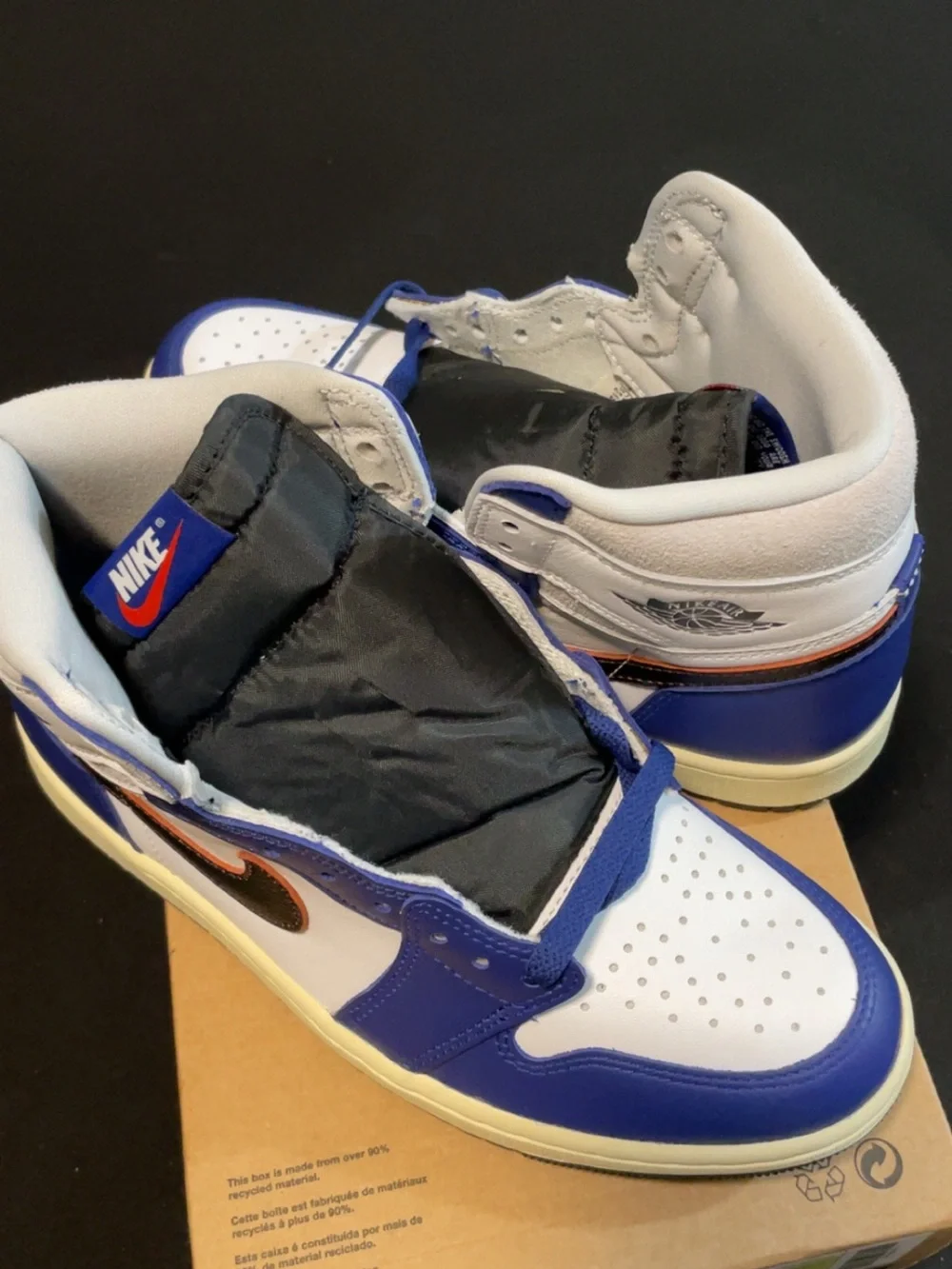 Nike Air Jordan 1 High in White and Blue with Black Swoosh